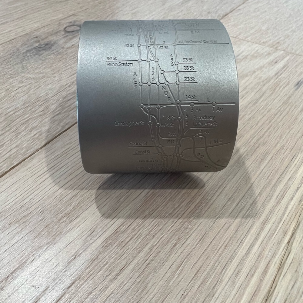 Brushed metal cuff bracelet of the NYC subway system
